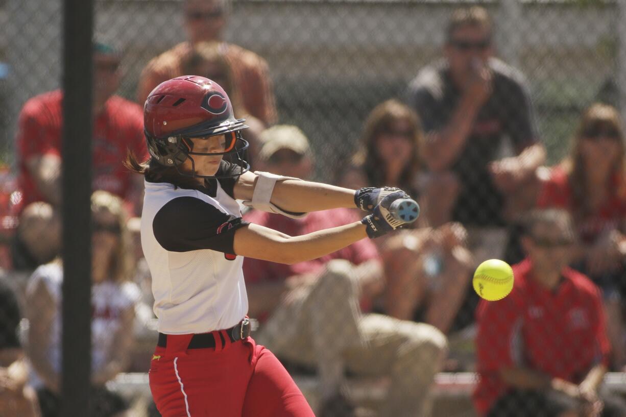 Camas catcher Abby Wong (1) hits a single against Gig Harbor during the sixth inning of the Papermakers' opening game at the Class 4A state tournament in Spokane.