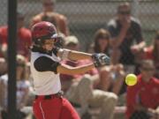 Camas catcher Abby Wong (1) hits a single against Gig Harbor during the sixth inning of the Papermakers' opening game at the Class 4A state tournament in Spokane.