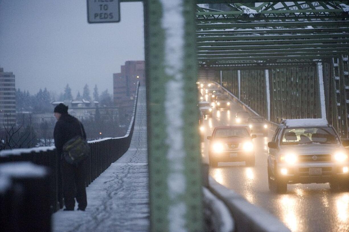 Southbound traffic rolls across the Interstate 5 Bridge during the morning commute on Wednesday.