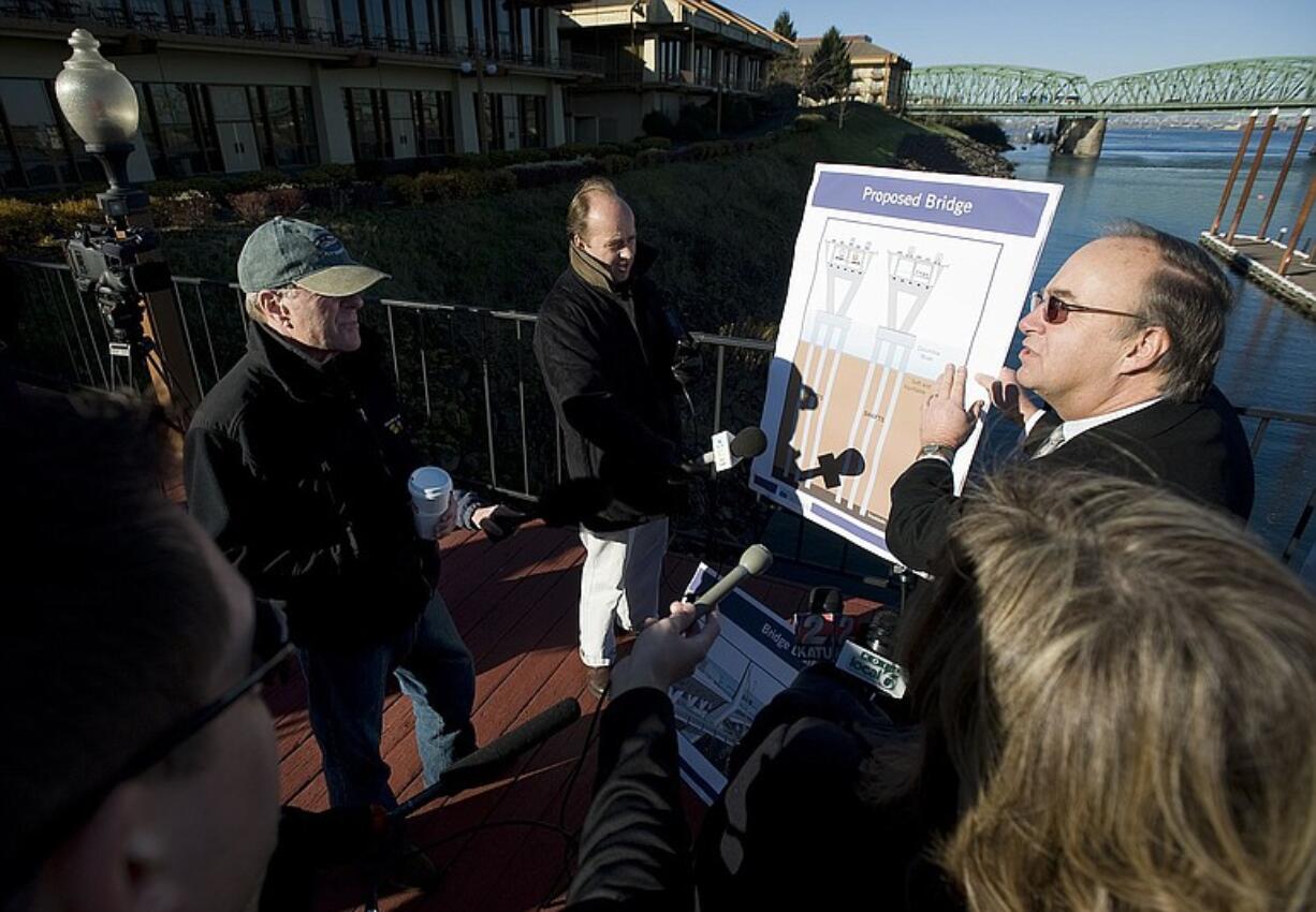 Washington Department of Transportation Regional Administrator Don Wagner, right, talks with Oregon Gov.