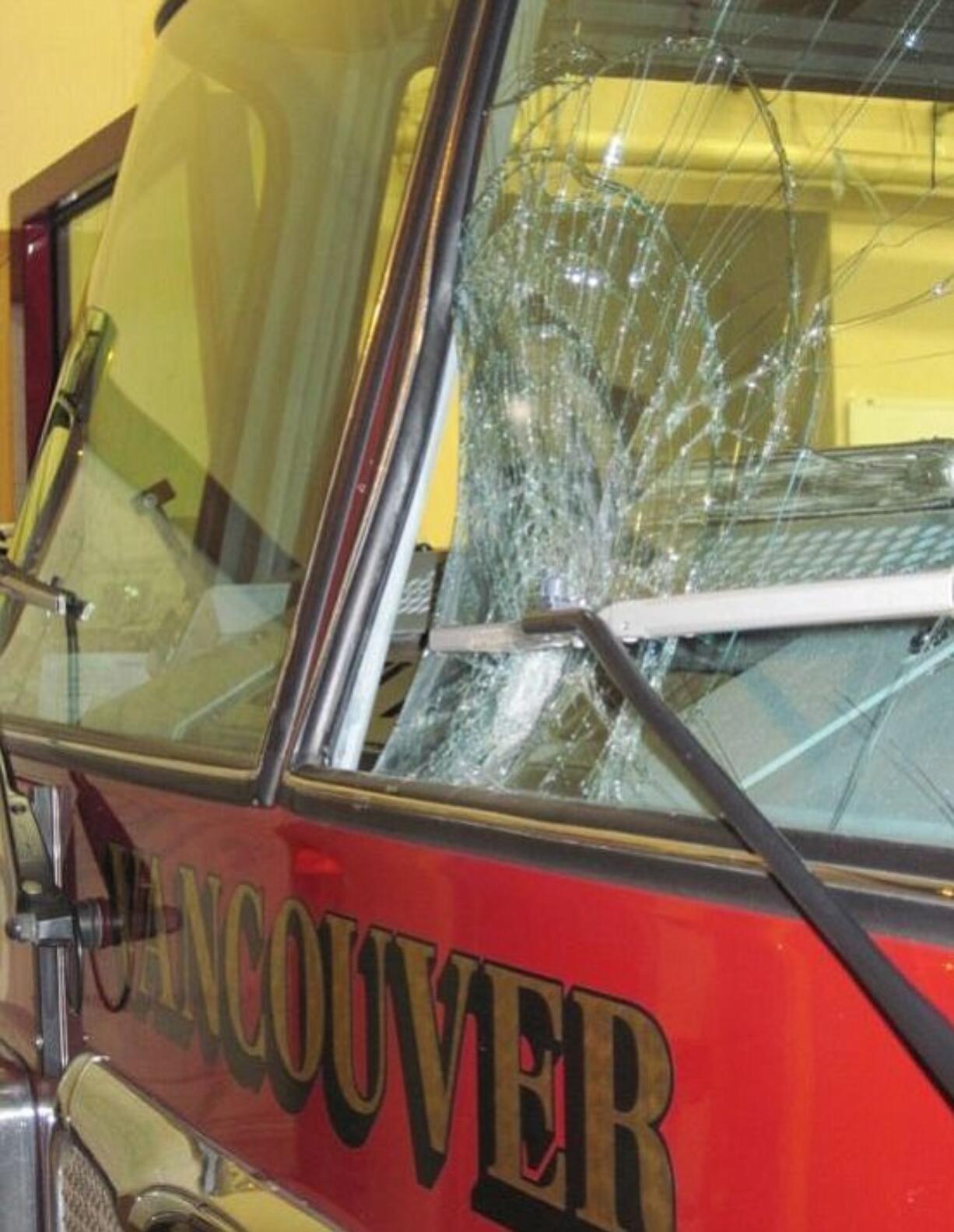 Shane Parker/Vancouver Fire Department
A large rock caved in part of the windshield of one of the Vancouver Fire Department's ladder trucks early Saturday.