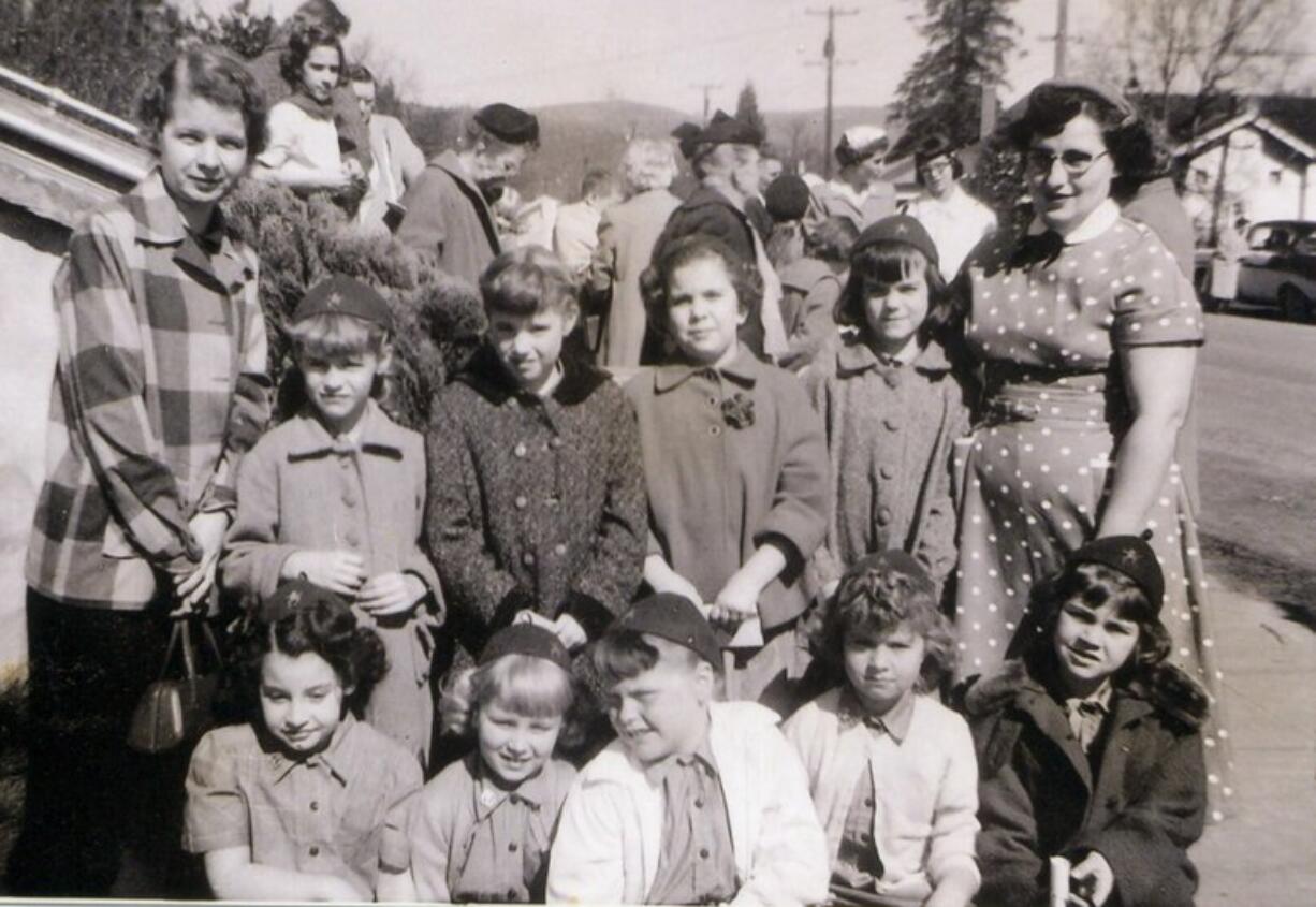 Woodland: Members of Brownie Troop 52 gather in front of the Christian Church in 1958.