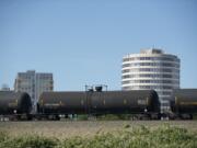 An oil train passes through downtown Vancouver last summer.