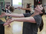 National Board Certified Teacher Kimberleigh Anderson instructs a dance class at Heritage High School on Monday. Evergreen Public Schools has nearly twice as many new National Board Certified teachers as all other Clark County school districts combined.