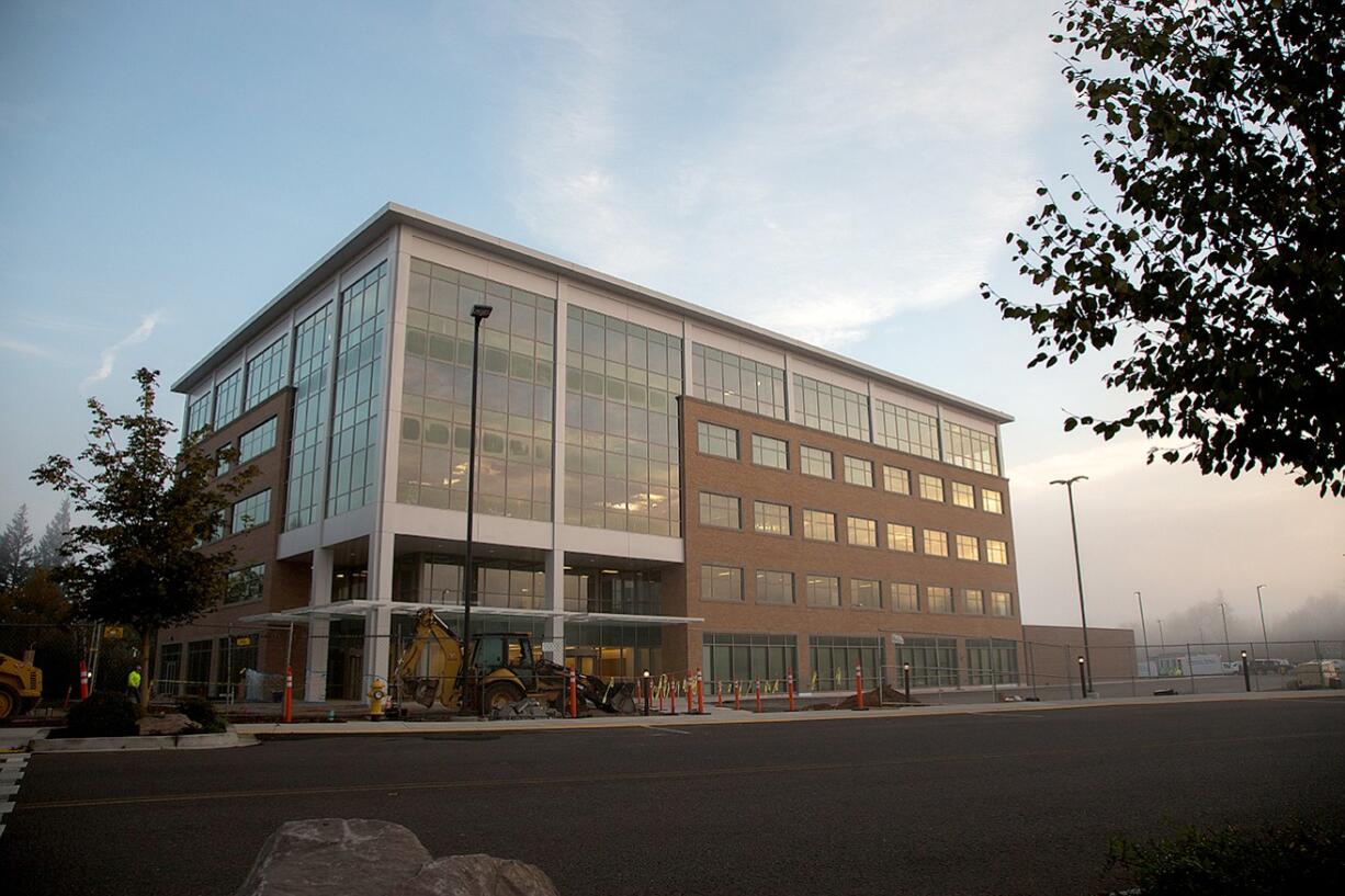 Fisher Investments’ campus in Camas houses some 975 employees in two 5-floor buildings and one smaller building.