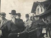 Vancouver Mayor John Kiggins, in center of the back seat, welcomed Great Northern Railway tycoon James J. Hill, with beard, during a visit. The photo was shot on Oct. 4, 1911, at Vancouver's railroad depot.