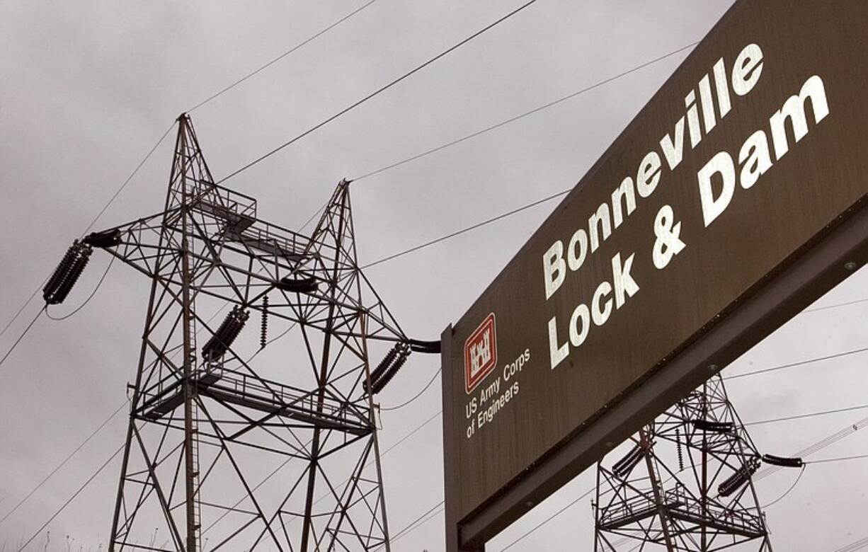 Power lines loom near Bonneville Dam on the Oregon side of the Columbia River.