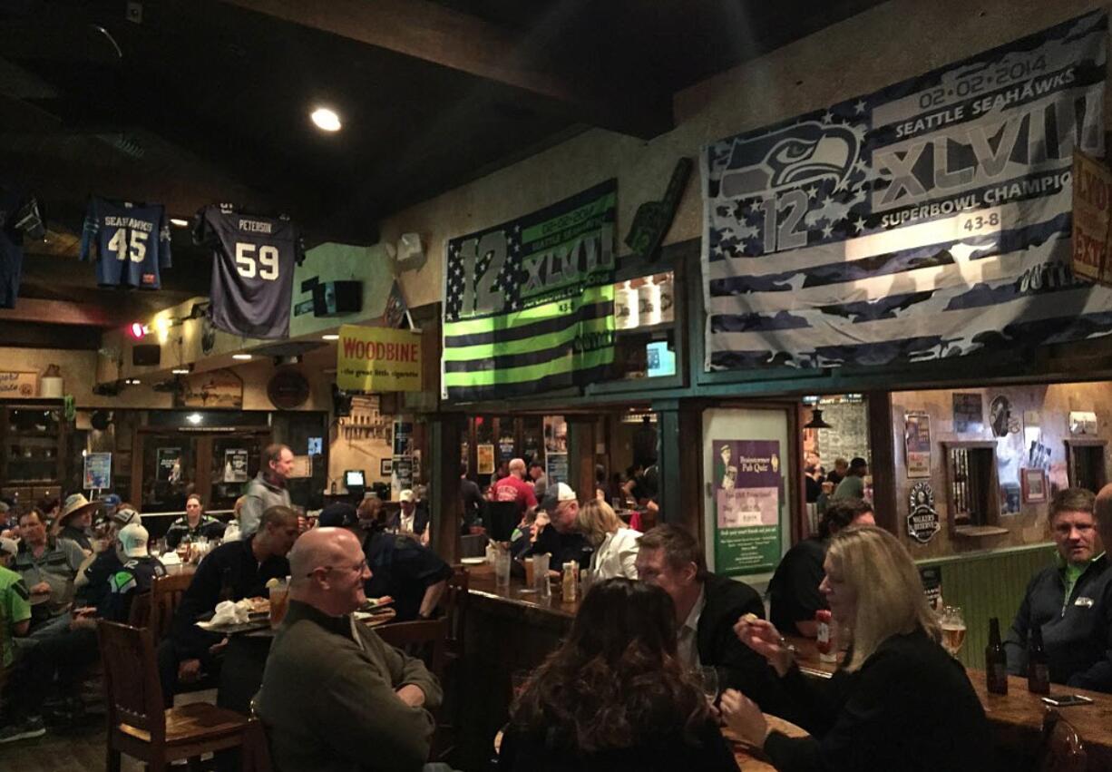 Seahawks fans gather at The Skeptical Chemist bar in Scottsdale, Ariz. The bar is home to a chapter of the Sea Hawkers booster club.