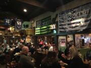 Seahawks fans gather at The Skeptical Chemist bar in Scottsdale, Ariz. The bar is home to a chapter of the Sea Hawkers booster club.