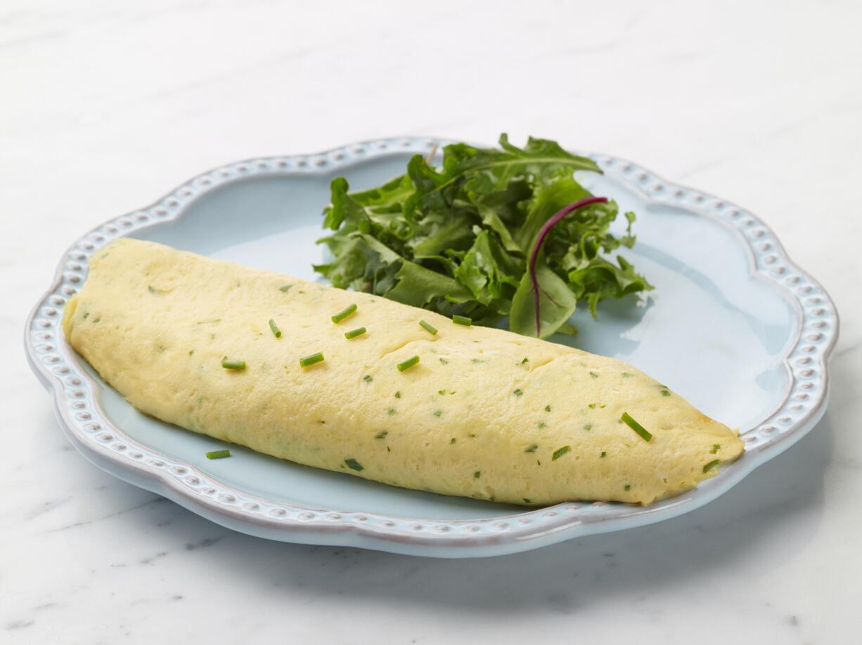 Gentle heat, constant stirring keys to the perfect omelet.