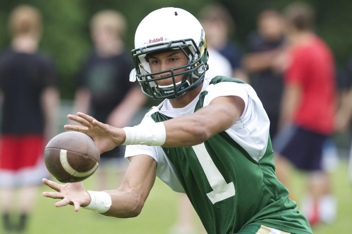 Evergreen High School wide receiver Justice Murphy at practice, Tuesday, June 3, 2014.