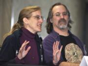 Writers Carrie Vaughn, left, and Satyros Phil Brucato discuss the popularity of wolf-women in the media during a talk Sunday at Howl Con in Vancouver.