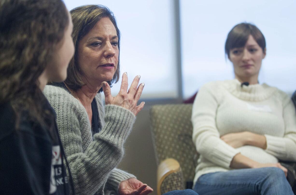 Debby Irvine, who lost her husband Rich Irvine to a vehicle crash, speaks to the press Dec. 28 in Vancouver.