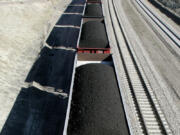 A train loaded with coal travels through northeast Wyoming near Gillette in 2006.