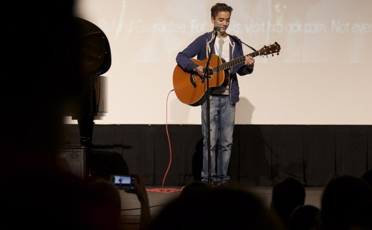 Daniel Seavey, 15, performs for a crowd at Union High School on Thursday after it was announced that he would progress to the Hollywood round on &quot;American Idol.&quot;