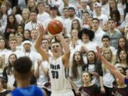 Cameron Cranston shoots as Union comes back in the fourth quarter to beat Curtis at the Class 4A regional round of state on Friday, Feb.