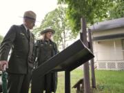 Jon Jarvis, director of the National Park Service, left, and Fort Vancouver Superintendent Tracy Fortmann, take a tour  of the Vancouver Barracks property in 2010.