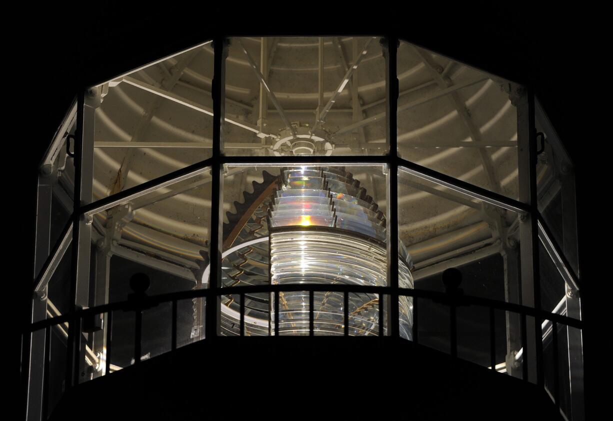 Point Pinos Lighthouse lantern room can be seen where a Fresnel lens works by bouncing and bending light rays from a 1,000-watt lamp gathered by the lens and focused out to sea in Pacific Grove, Calif., on February 25, 2015. It is the oldest continuously operating lighthouse on the West Coast of the United States and even the lens is original. It was first lit February 1, 1855.