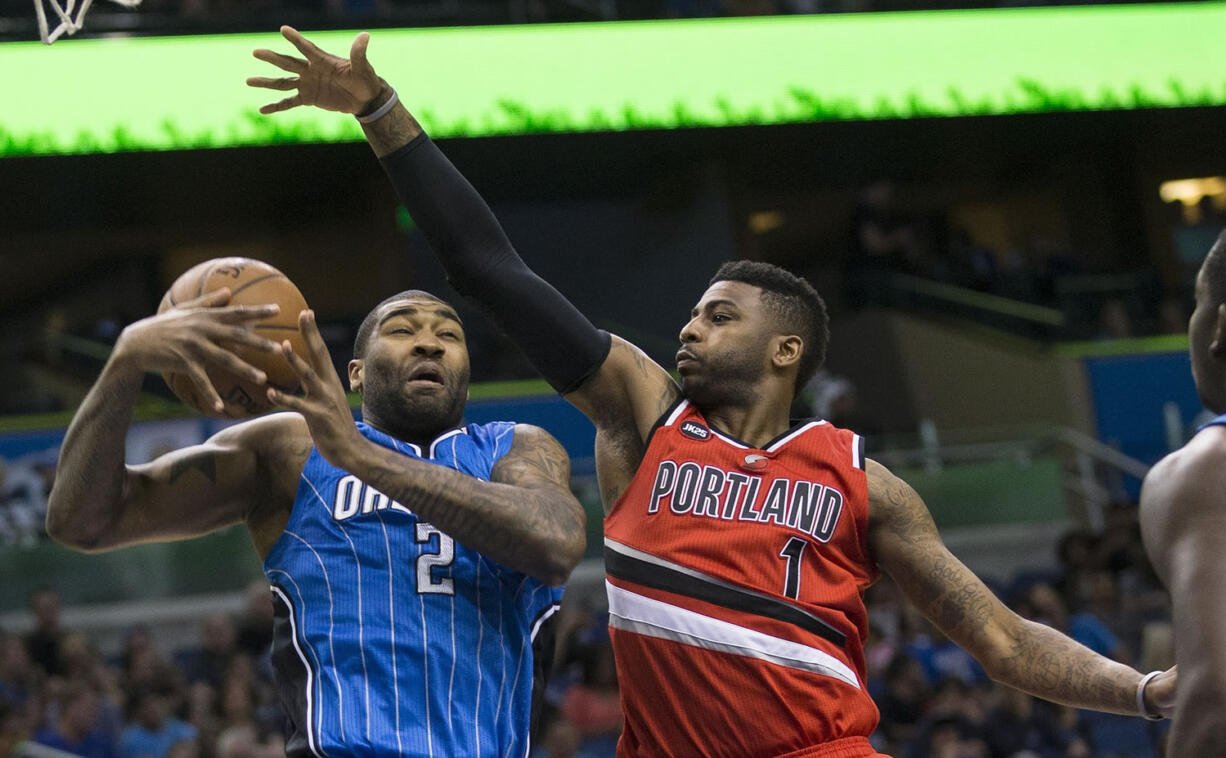 Portland's Dorell Wright (1) defends against Orlando's Kyle O'Quinn.