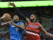 Portland's Dorell Wright (1) defends against Orlando's Kyle O'Quinn.