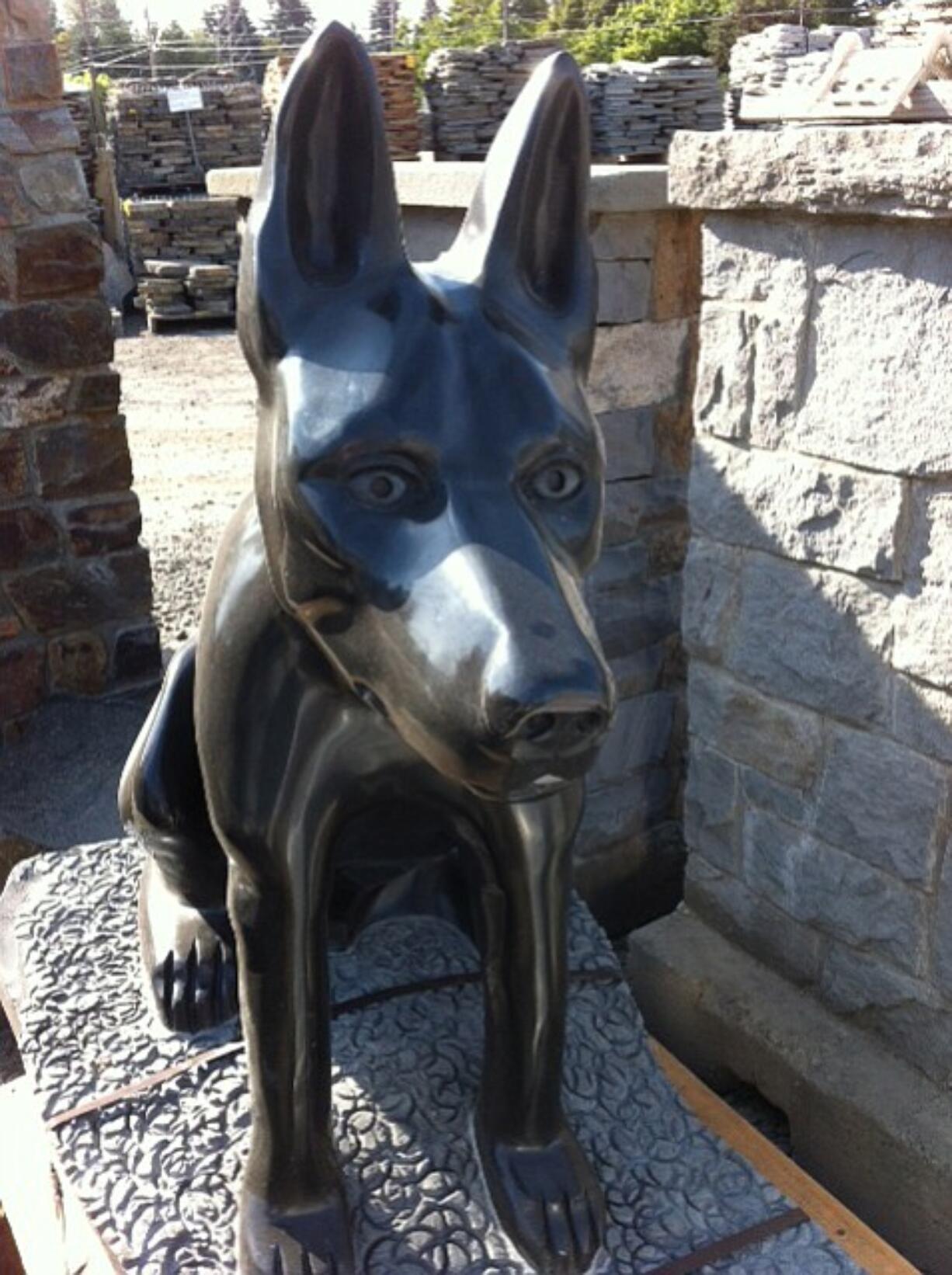 Mark McLean's basalt statue memorializing Clark County Sheriff's Office K-9 Kane, who was killed in 2011, remains in storage while a permanent site is found for a memorial.