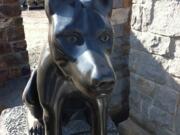 Mark McLean's basalt statue memorializing Clark County Sheriff's Office K-9 Kane, who was killed in 2011, remains in storage while a permanent site is found for a memorial.