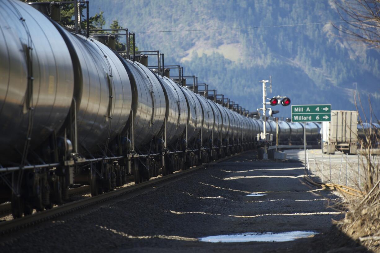 A train hauling oil passes through the Columbia River Gorge on its way to Vancouver in March.