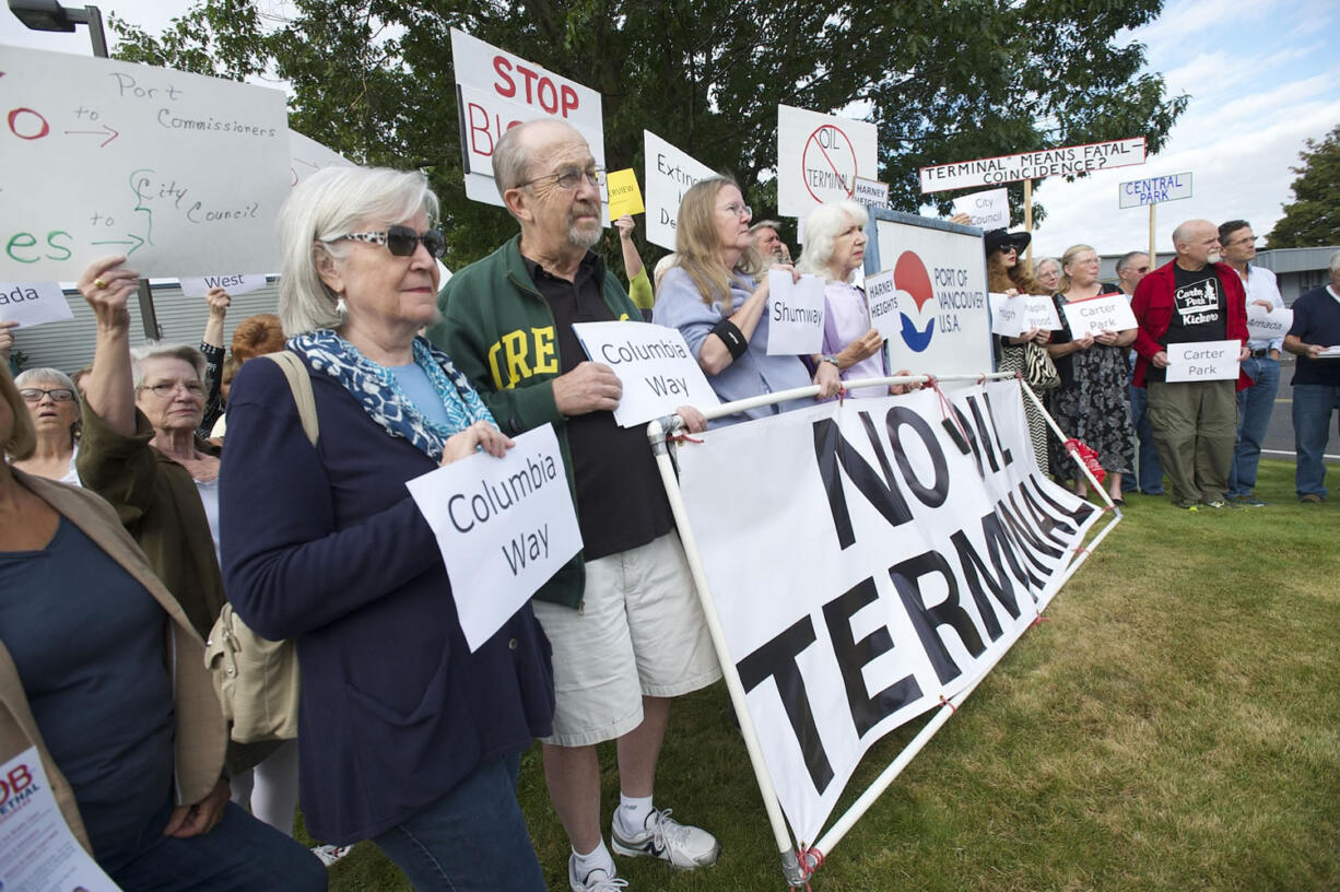 Opponents of building the Northwest's largest oil-by-rail terminal in Vancouver attend the Port of Vancouver's public hearing on Sept. 9, 2014. Leaders of Vancouver neighborhood associations continue to demand that port commissioners hold a public hearing to reconsider its lease with Tesoro Corp.