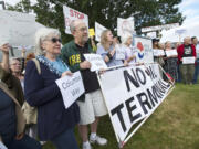 Opponents of building the Northwest's largest oil-by-rail terminal in Vancouver attend the Port of Vancouver's public hearing on Sept. 9, 2014. Leaders of Vancouver neighborhood associations continue to demand that port commissioners hold a public hearing to reconsider its lease with Tesoro Corp.