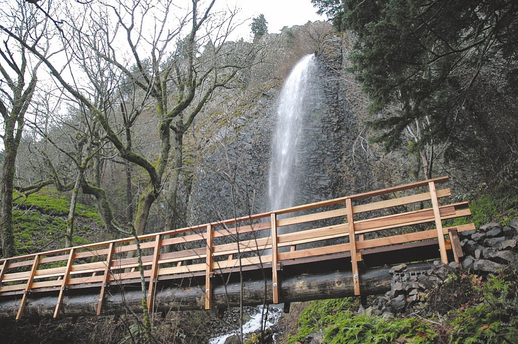 Allen Thomas/Columbian files
Hikers on the Cape Horn trail in the Columbia River Gorge National Scenic Area can take this bridge, shown in 2013, to walk alongside Cape Horn Falls.