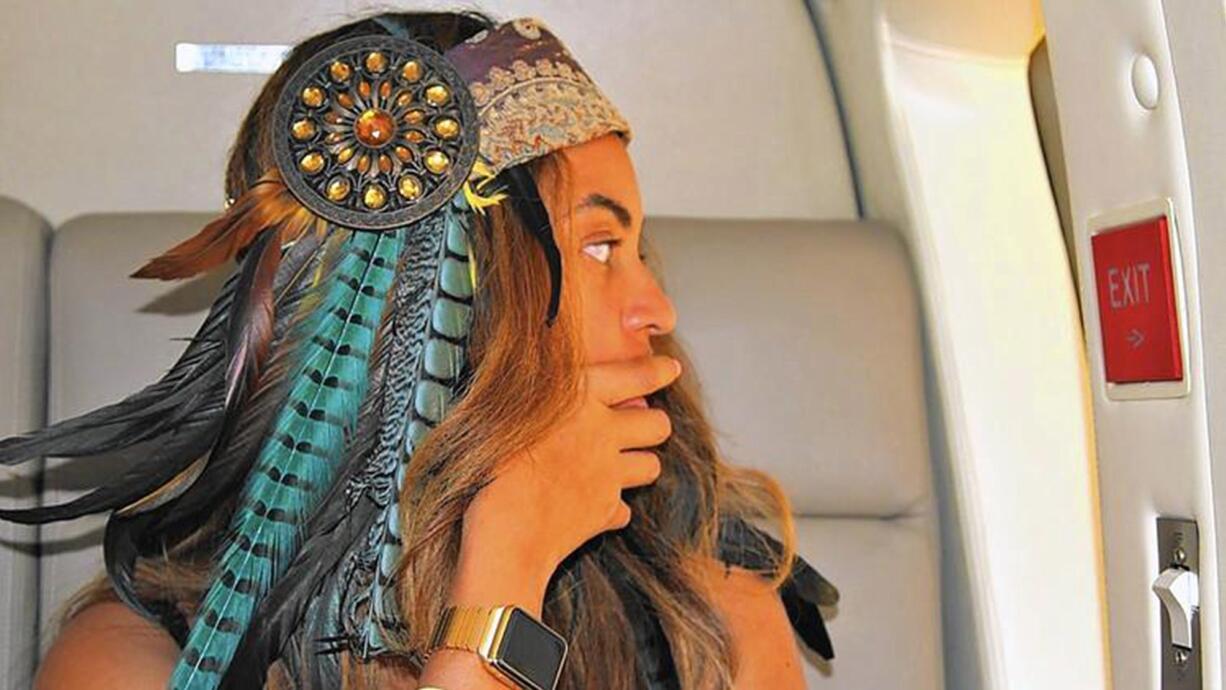 Beyonce sports her custom-made 18-karat gold link Apple Watch, which is estimated to be worth more than $17,000.