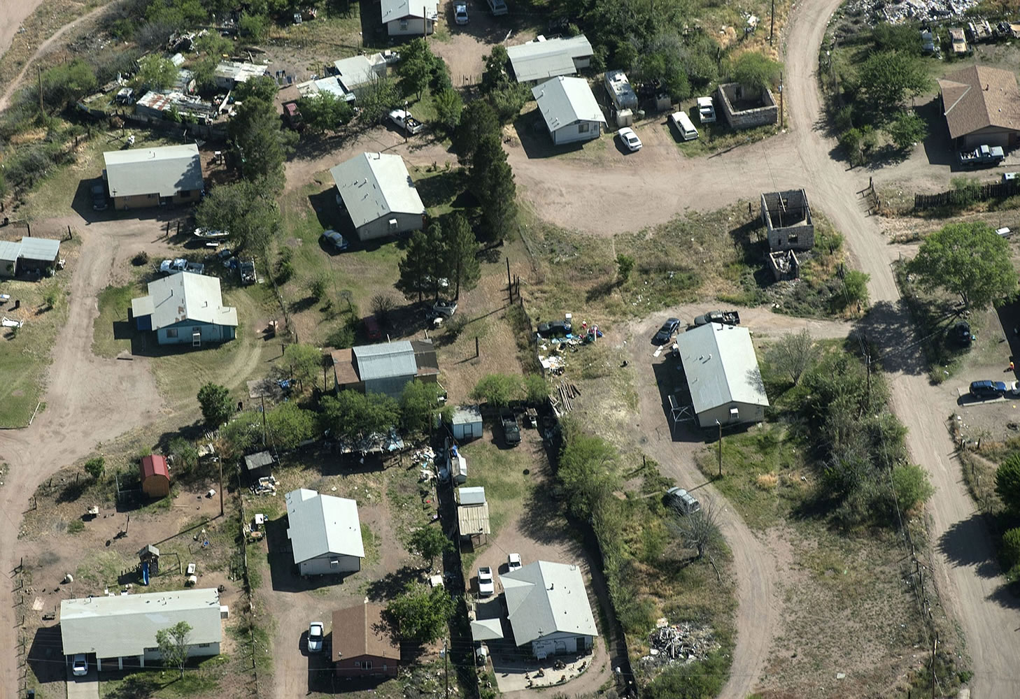 Photos by Ed Crisostomo/Orange County Register
Dirt roads line a neighborhood in the San Carlos Apache Reservation in Arizona.