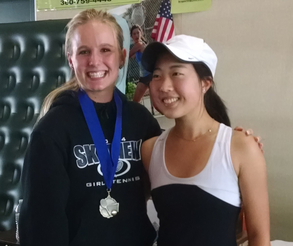 2015 4A district single champion Sammi Hampton of Skyview, left, and runner-up Esther Kwon of Camas.