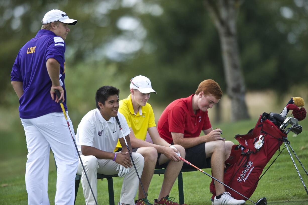 Zachary Kaufman/The Columbian
From left, Spencer Long of Columbia River, Eddie Abellar of Union, Spencer Tibbits of Fort Vancouver and Brian Humphreys of Camas wait to tee off on the 18th hole during the Jeff Hudson Golf Tournament last September. All four golfers will be in action in state tournaments this week. Abellar and Humphreys will play in the 4A tournament at The Creek at Qualchan in Spokane, while Long and Tibbits will be at the 3A tournament at Canyon Lakes in Kennewick.