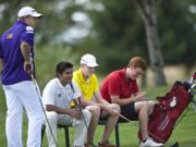 Zachary Kaufman/The Columbian
From left, Spencer Long of Columbia River, Eddie Abellar of Union, Spencer Tibbits of Fort Vancouver and Brian Humphreys of Camas wait to tee off on the 18th hole during the Jeff Hudson Golf Tournament last September. All four golfers will be in action in state tournaments this week. Abellar and Humphreys will play in the 4A tournament at The Creek at Qualchan in Spokane, while Long and Tibbits will be at the 3A tournament at Canyon Lakes in Kennewick.