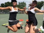 Camas sophomore Hannah Gianan, left, and senior Jenn Lewis, after winning their second consecutive Class 4A state girls doubles title. (Photo courtesy of Dr.