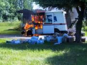 A mail truck caught fire Friday morning in north Clark County.