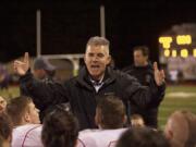 Camas coach Jon Eagle talks to the team after the Evergreen Game, October 11, 2013.Camas beats Evergreen 62-15.