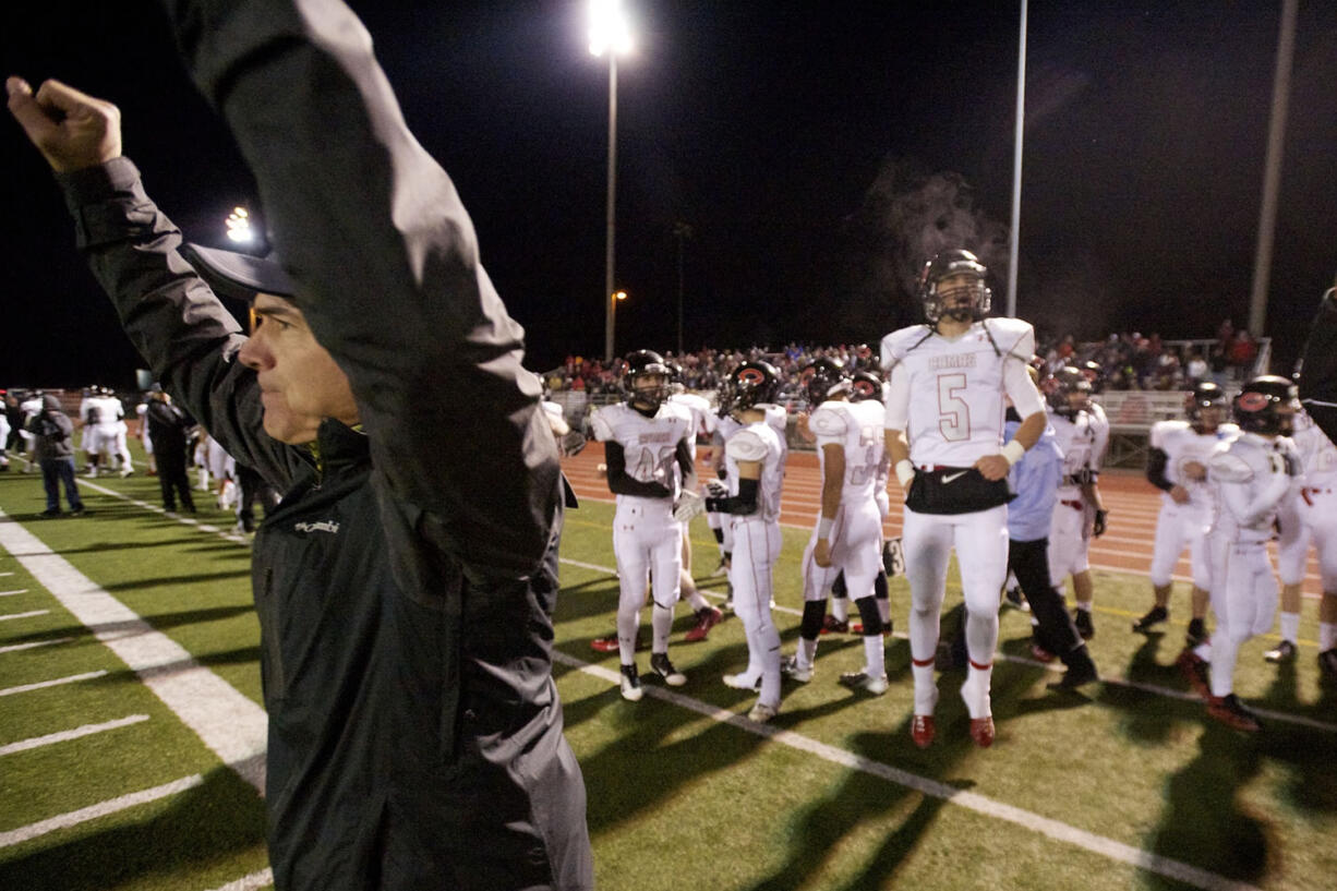 Camas head coach Jon Eagle reacts after beating Eastlake at Eastlake High School, Saturday, November 23, 2013. Camas won 47-28.