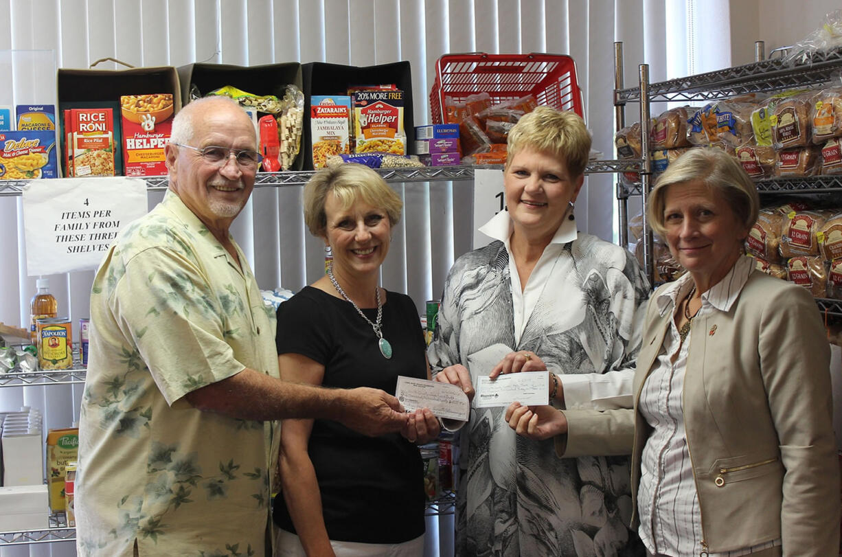 Central Park: The Lewis River Rotary and Battle Ground Rotary clubs raised $13,500 for the North County Food Bank, and presented the check on June 25.