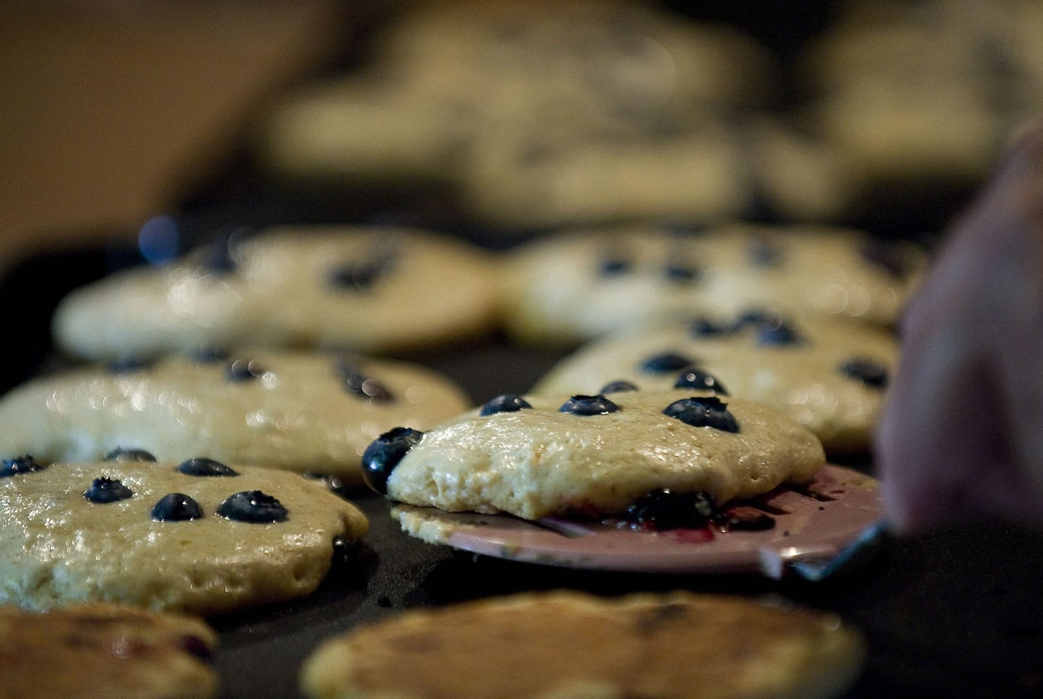 Blueberry pancakes are served to visitors during a sampling event at the Cedar Creek Grist Mill in Woodland.