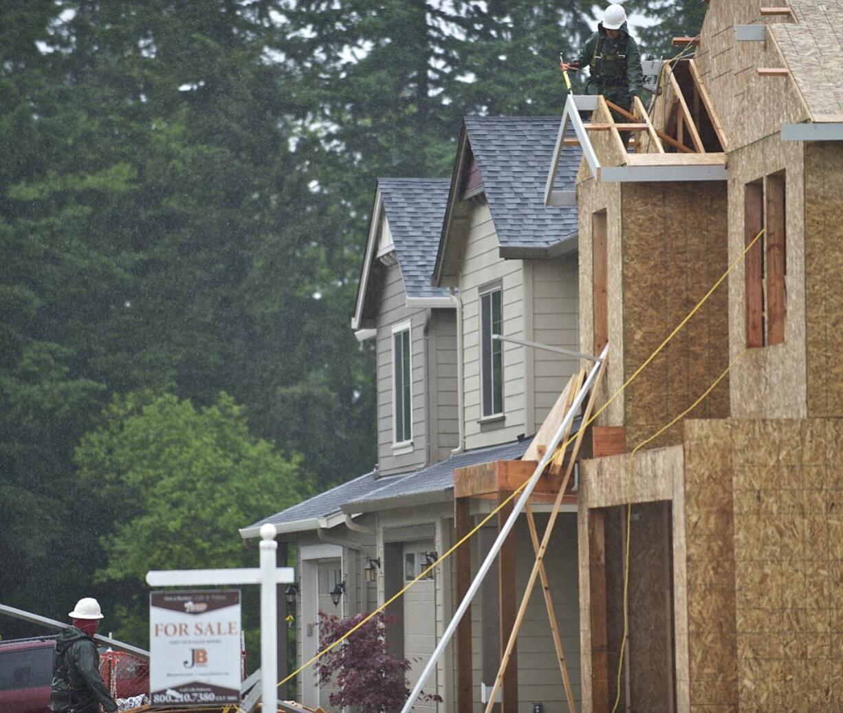 This photograph, taken in May 2013, shows homes under construction in Ridgefield's Pioneer Canyon neighborhood. Population figures released Monday show Ridgefield was the second-fastest-growing city statewide from April 2013 to April 2014, with a growth rate of 8.8 percent.