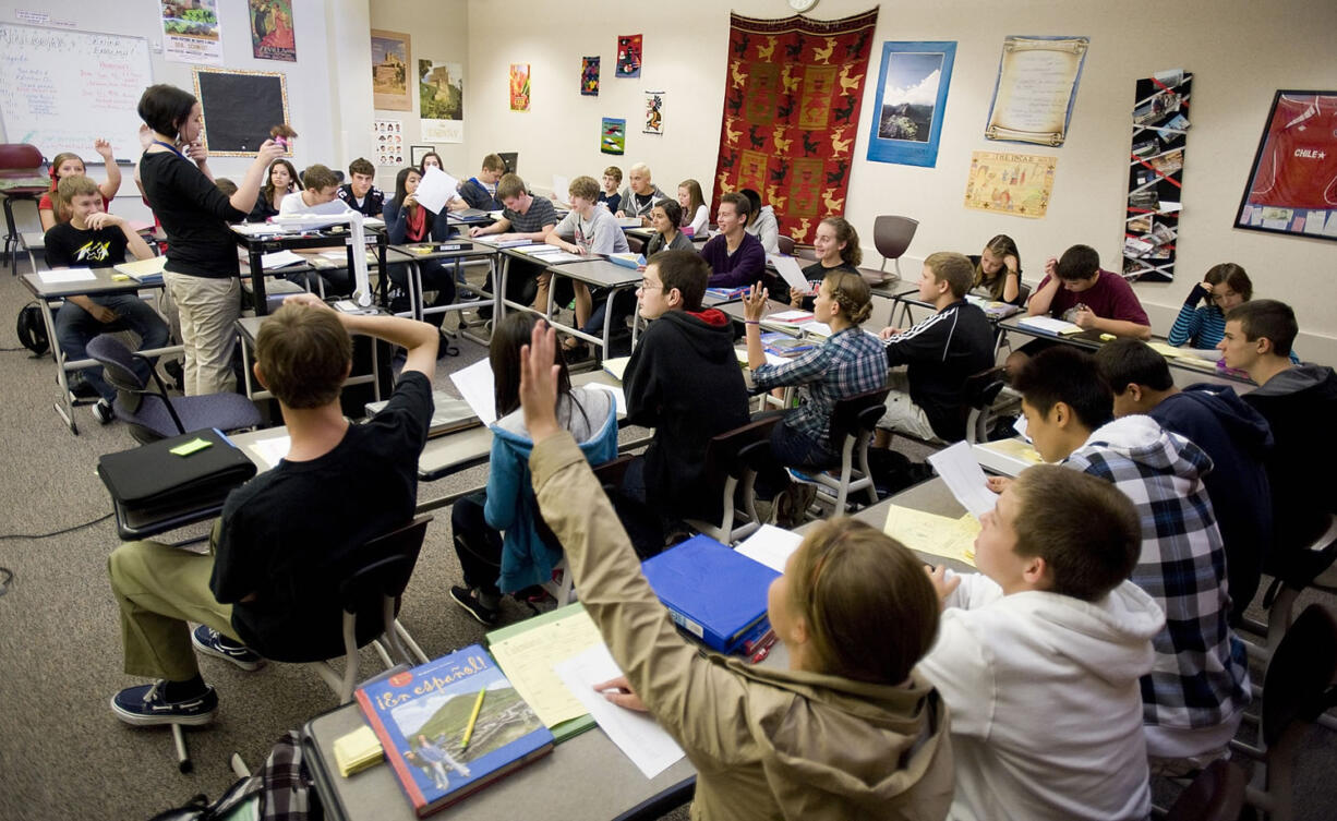 Jamie Rodda teaches Spanish 1 to a full classroom at Camas High School in 2011.