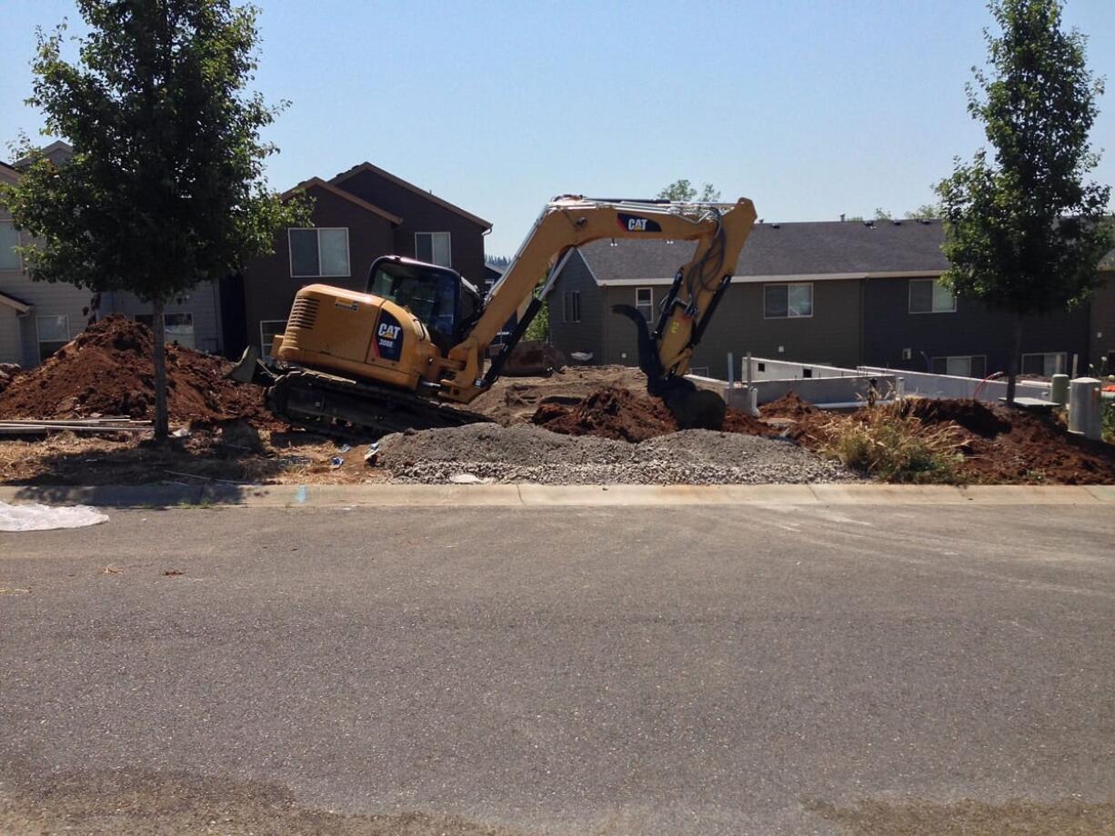 A backhoe at a site under development in Camas struck a 2-inch natural gas line, prompting nearby residents to shelter in place.