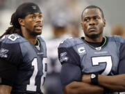 Sidney Rice, left, cited fallout from injuries and concussions in his decision to retire.