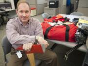 Scott Johnson, the emergency management division manager with the Clark Regional Emergency Services Agency, has compiled an earthquake survival kit. Johnson says that when disaster strikes, the community will work together to survive.