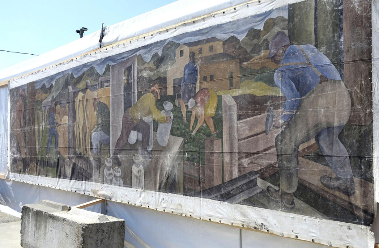 A large mural, then still unidentified, is displayed Aug. 8 at the Skagit County Fair in Mount Vernon. The canvas is an original 1941 painting by William Cumming, a painter of the Northwest School.