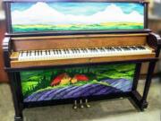 An old-fashioned upright piano, hand-painted by artist Natalie Andrzejeski, will be on display in downtown Camas starting Friday evening as part of the Keys to the City fundraiser for the School of Piano Technology for the Blind.