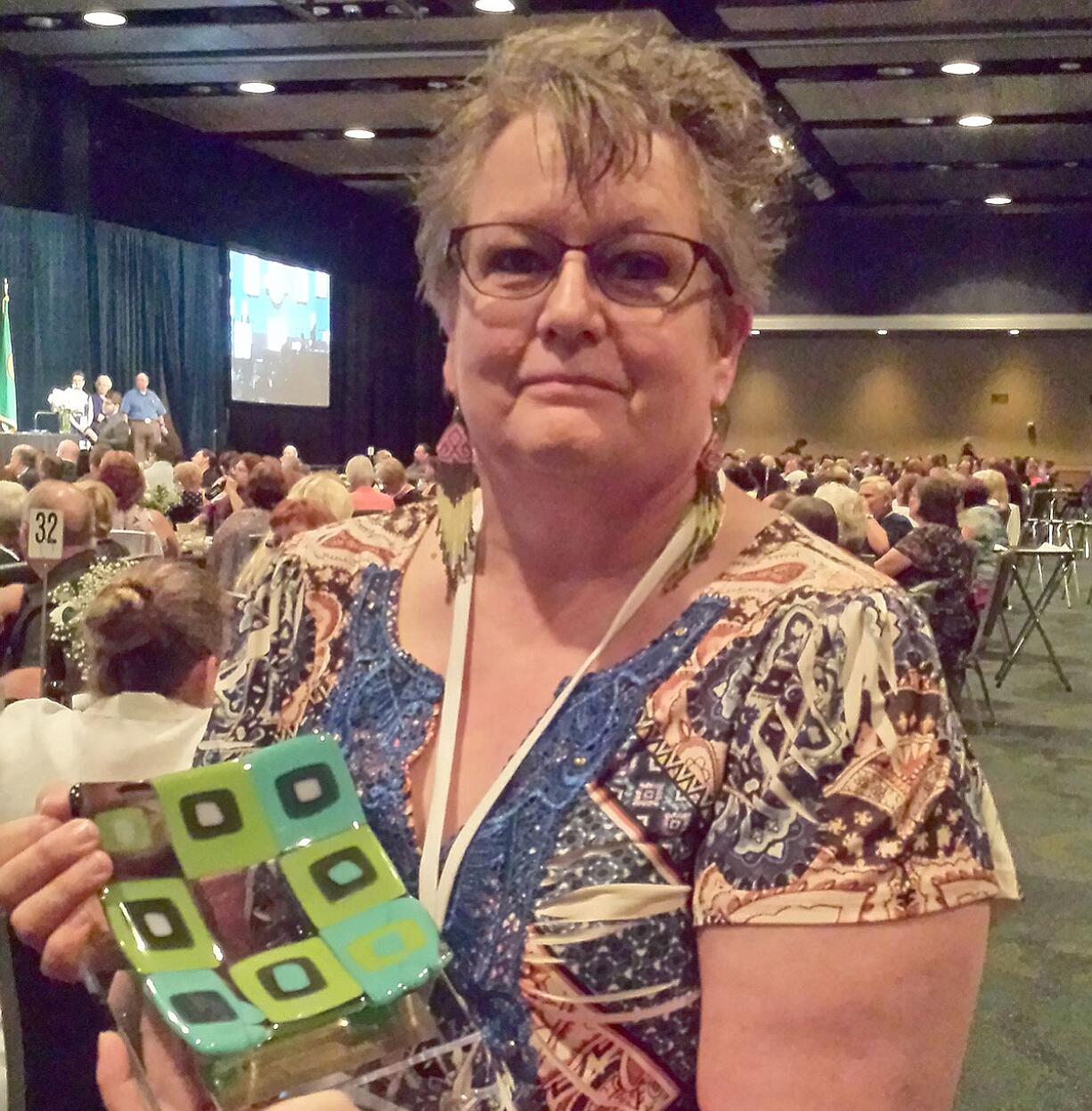 Washougal School District employee Trish Happs was recently honored for her leadership at a statewide convention.