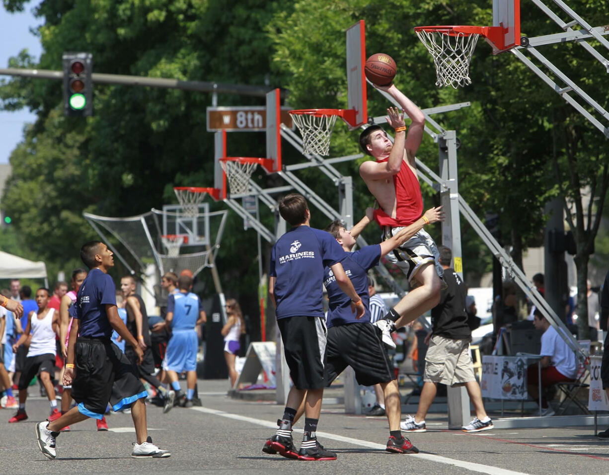 Hoops on the River basketball action from 2014 on downtown Vancouver streets.